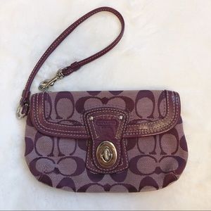 Coach purple signature wristlet in silver hardware
